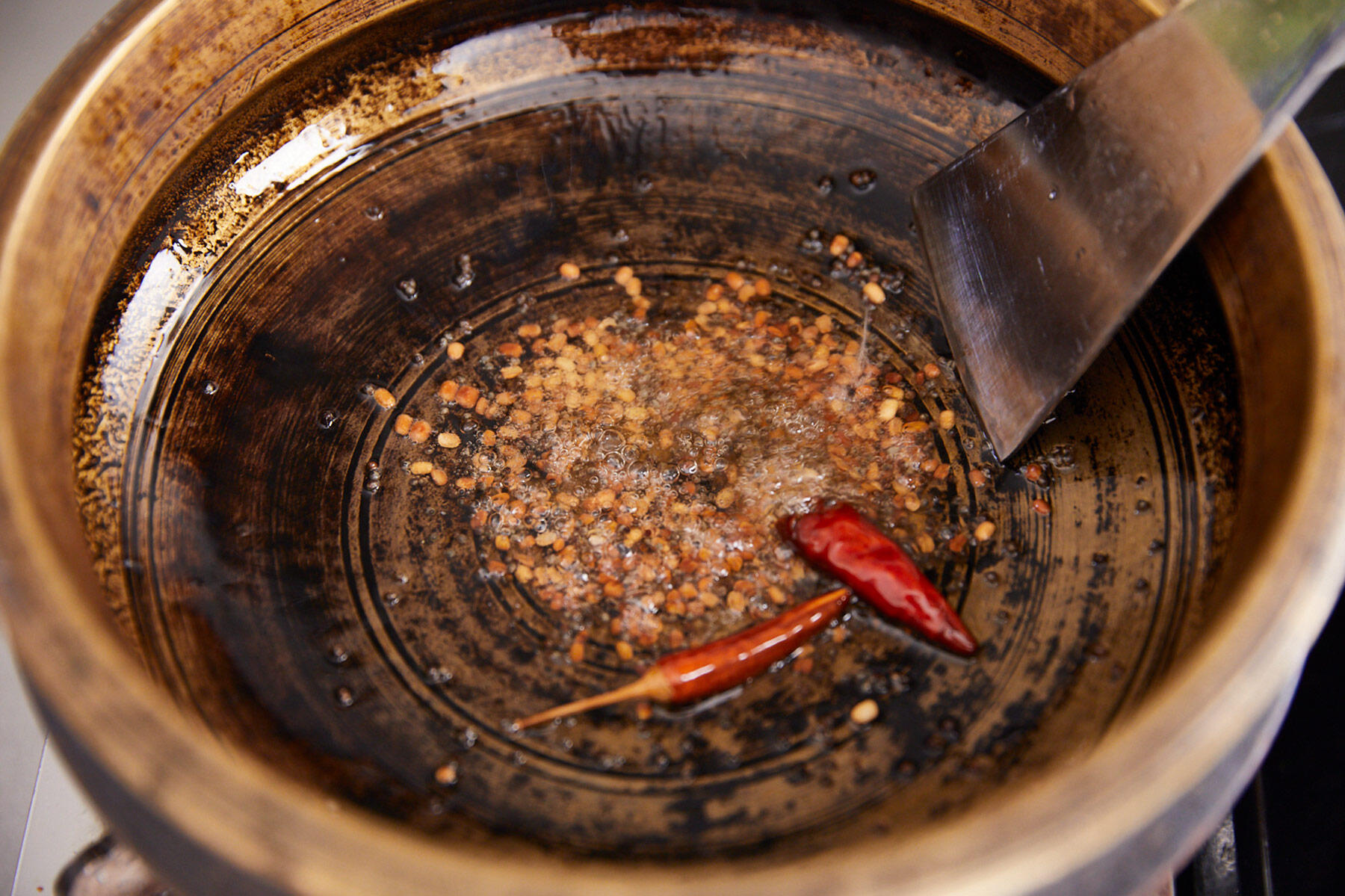 スパイスに火を通す