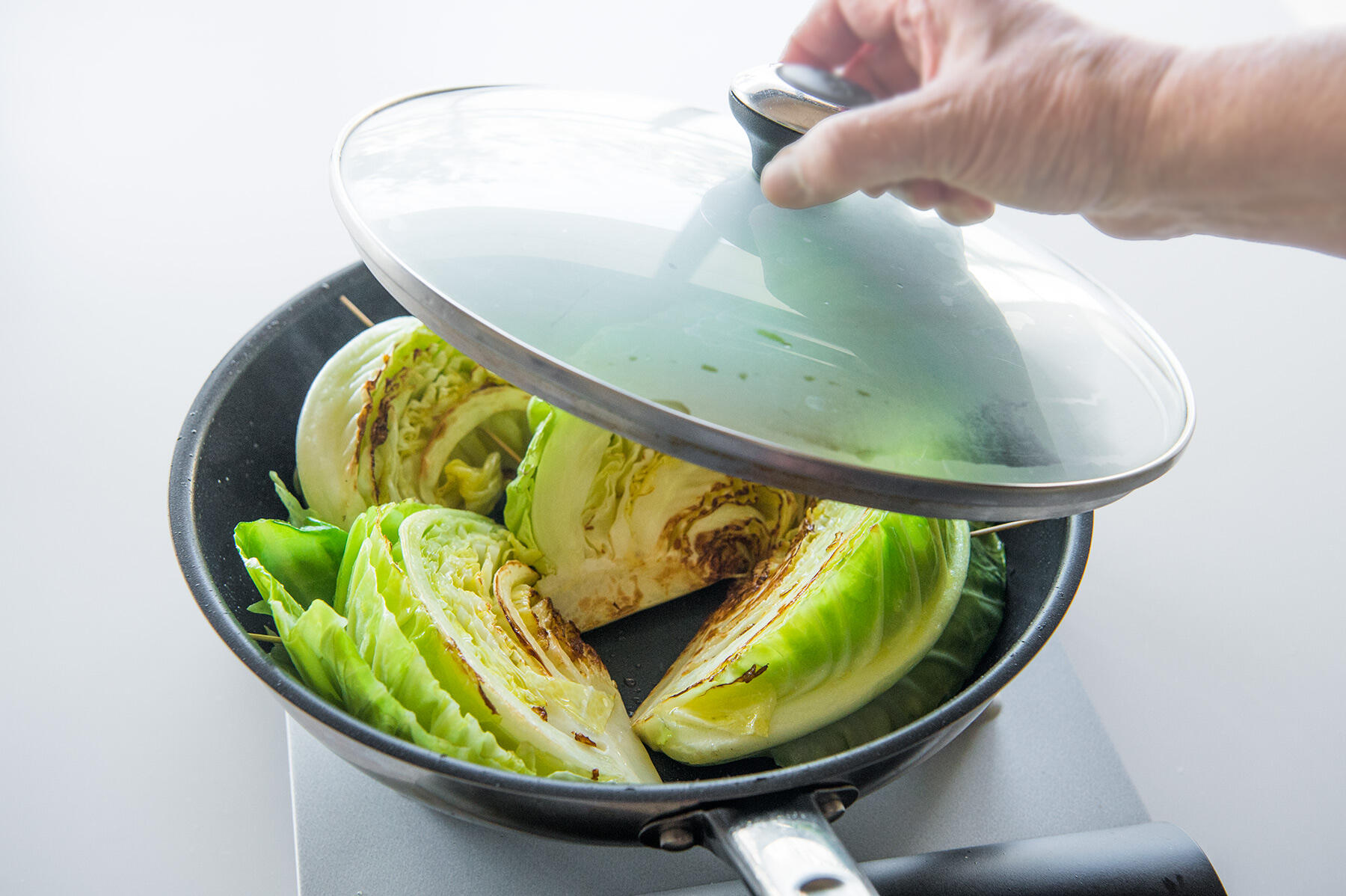 蒸し焼きにする