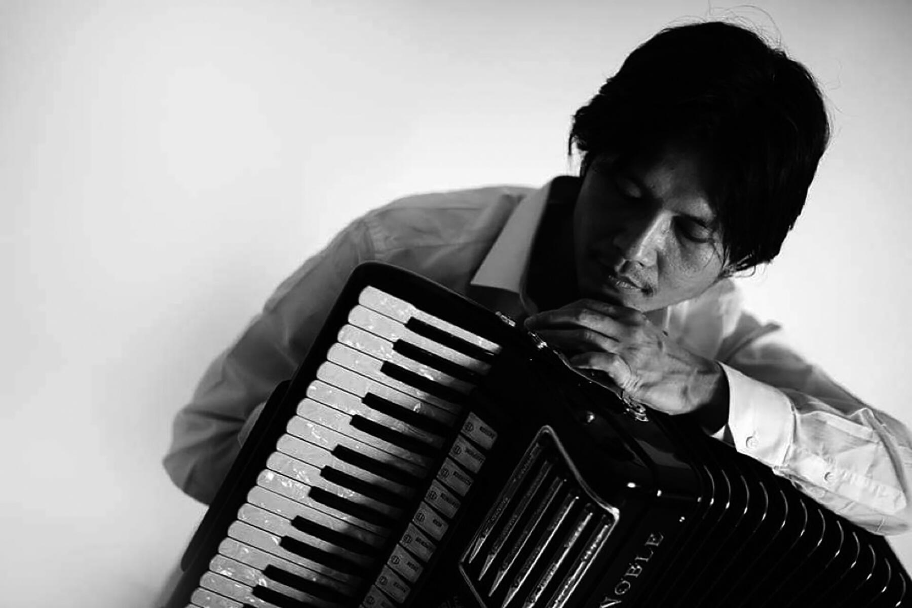 佐藤芳明